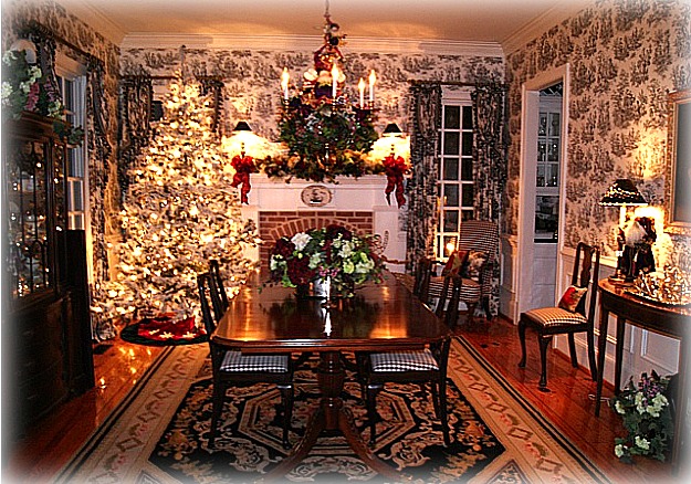 dining room with toile wallpaper and Christmas tree by fireplace