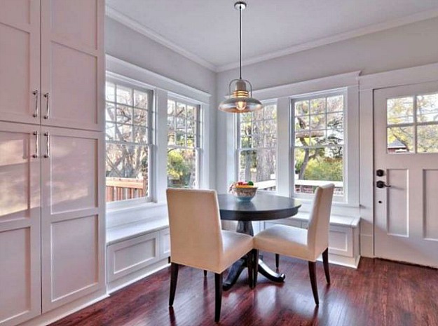 kitchen eating area after remodel with banquette seating