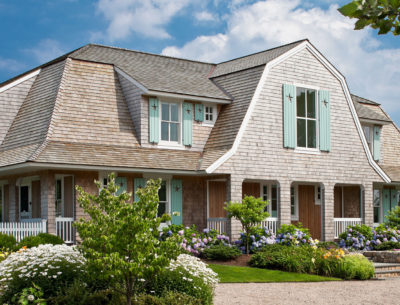 A Shingle-Style House on Cape Cod with Aqua Shutters