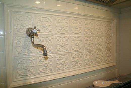 backsplash tile over range pot filler