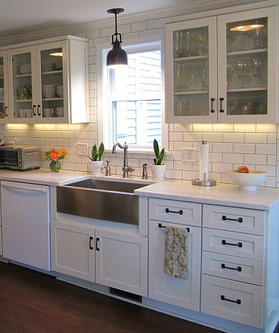 White farmhouse sink with white deals cabinets