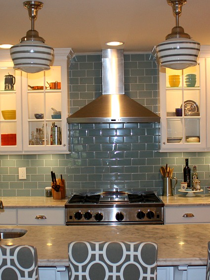 A stove top oven sitting inside of a kitchen