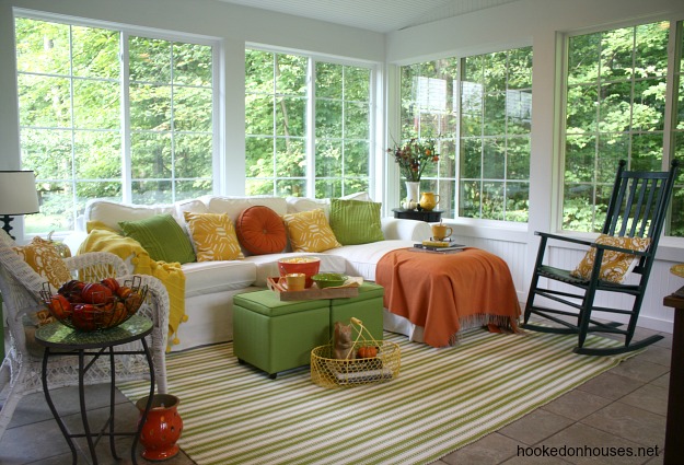 sunroom decorated for fall