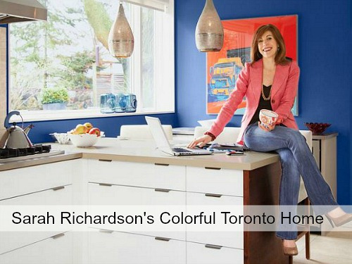 Sarah Richardson sitting on kitchen countertop