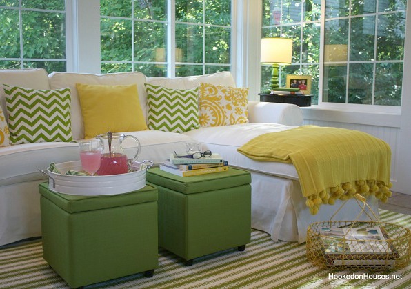 Ektorp sofa in the sunroom with green ottomans