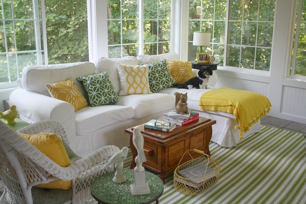 green and yellow pillows on the Ektorp sofa