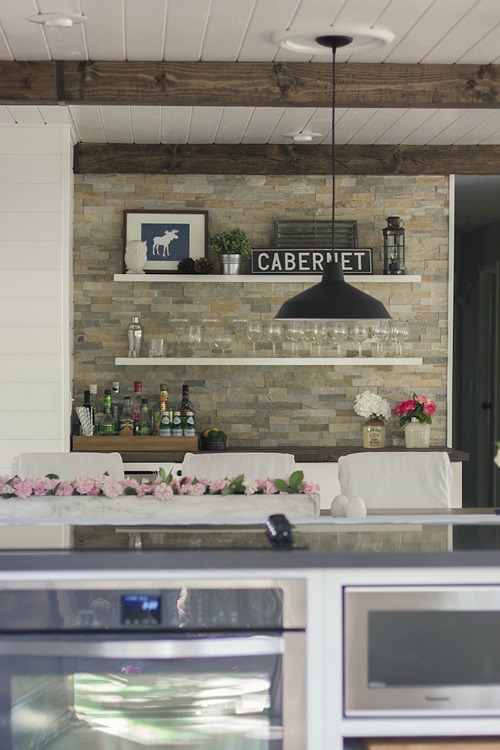 dining area after makeover with floating shelves