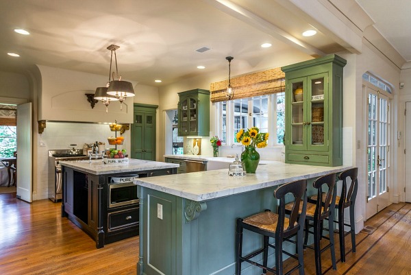 A kitchen with an island in the middle of a room