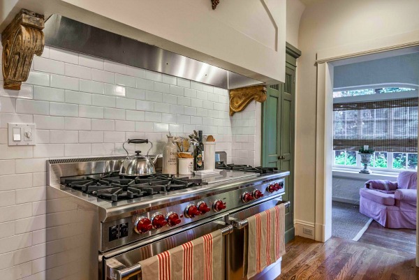 A stove top oven sitting inside of a kitchen