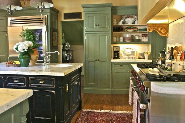 A kitchen with a stove and a sink