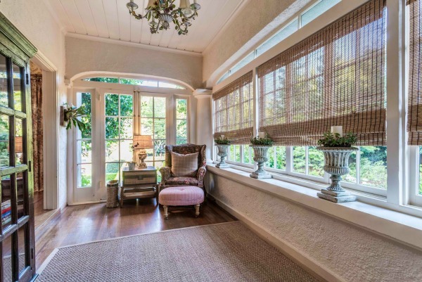 Sunroom with armchair in corner