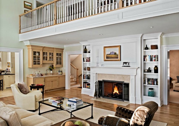 A living room filled with furniture and a fire place