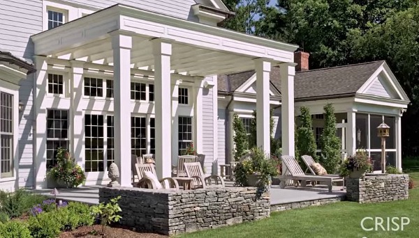 covered patio on back of modern farmhouse