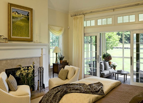 A living room filled with furniture and a large window