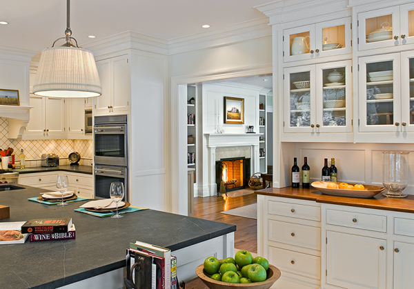 view of living room fireplace from kitchen