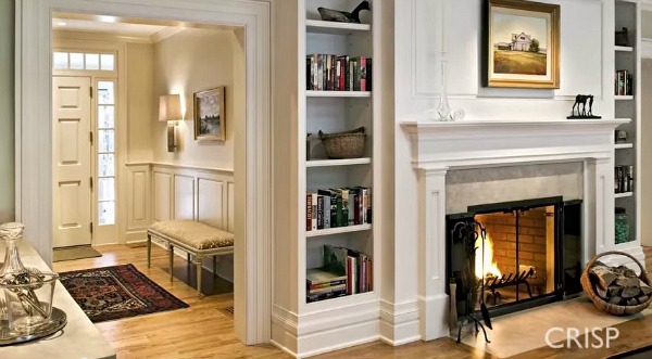 A fireplace in a living room filled with furniture and a fire place