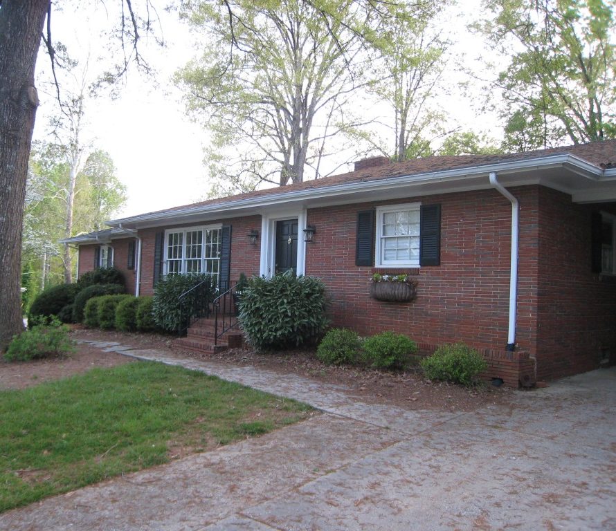 Painted House Brick Ranch exterior BEFORE