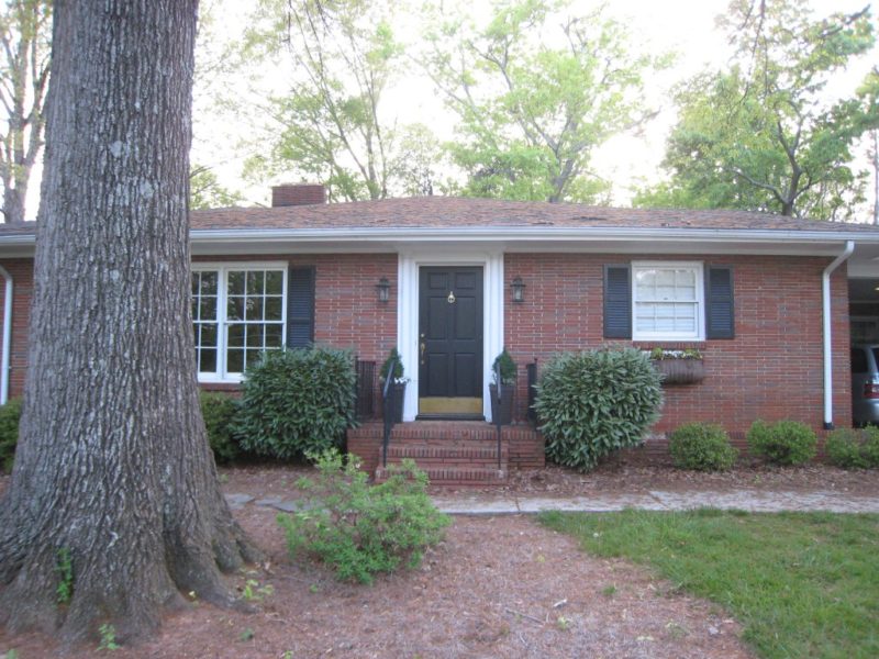 Painted House Red Brick Ranch exterior BEFORE