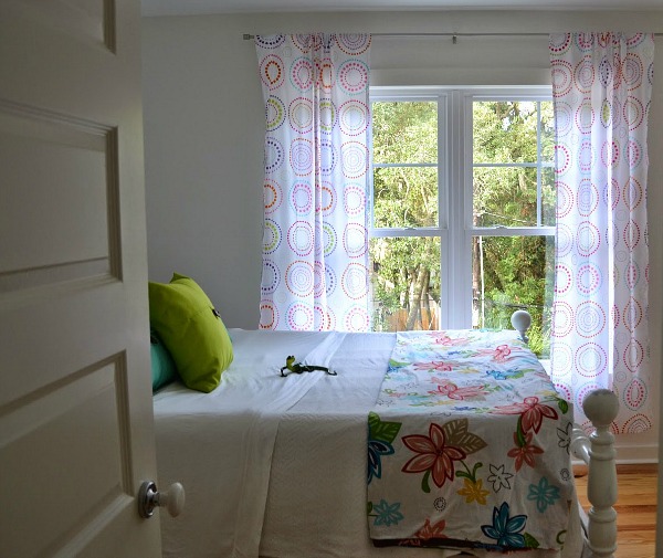 A bedroom with a large window