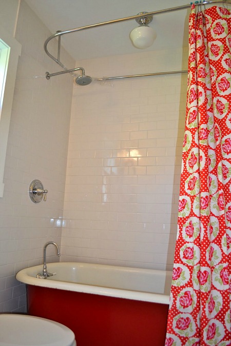 A shower with shower curtain