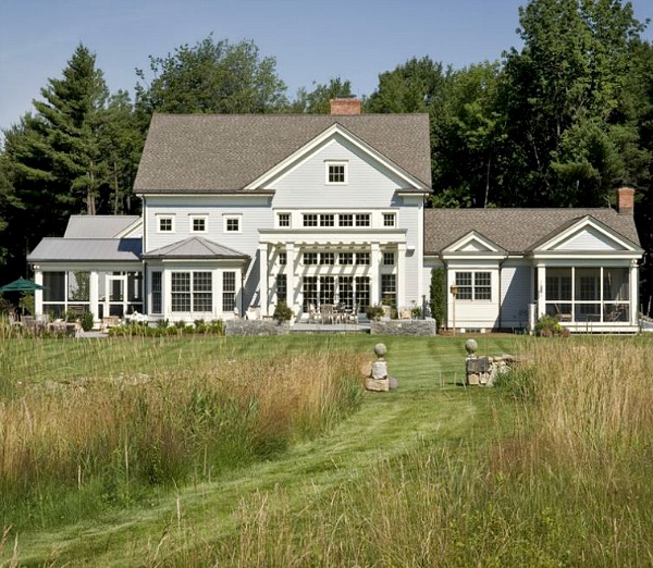 back exterior of large modern farmhouse