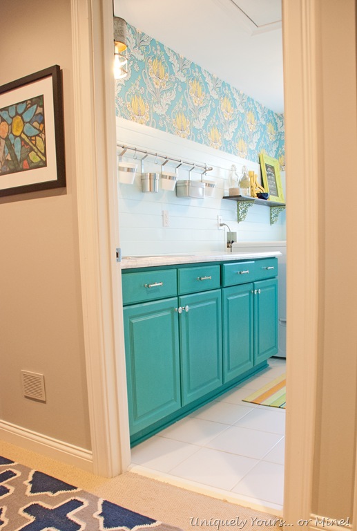 susan's laundry room teal cabinets