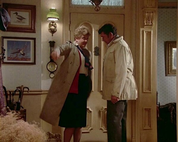 Angela Lansbury standing inside front door of her house on Murder She Wrote