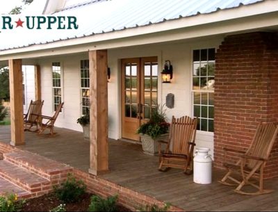 front porch of Chip and Joanna's farmhouse in Waco with Fixer Upper logo inset