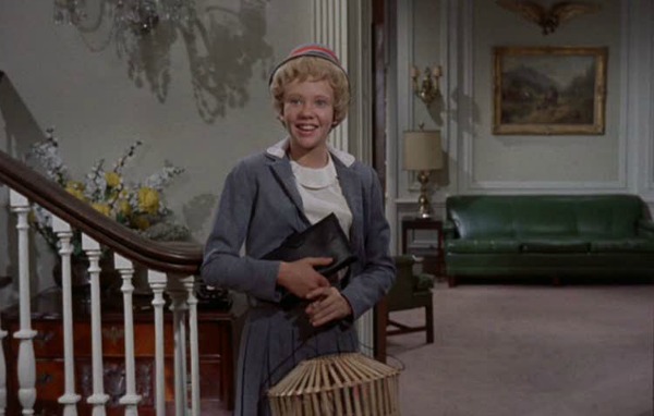 Hayley Mills standing in a room