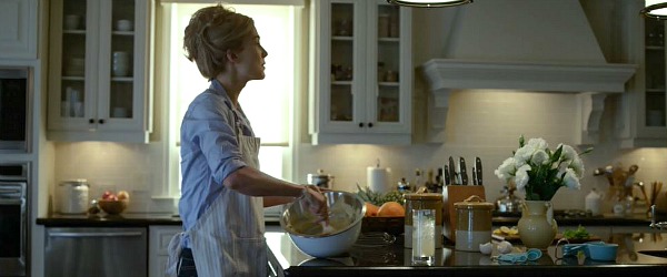 A person standing in a kitchen preparing food in Gone Girl