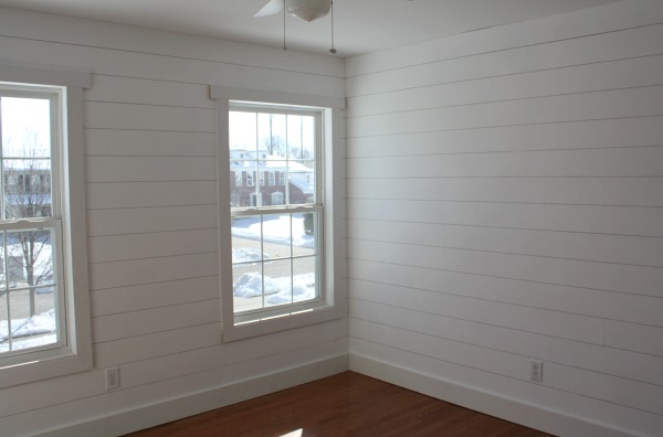 bedroom with shiplap and hardwood floors installed | hookedonhouses.net