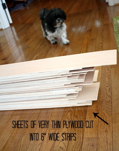 Strips of plywood cut into 6" strips for shiplap | hookedonhouses.net