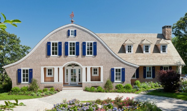 front exterior of Shingle style home with bright blue shutters