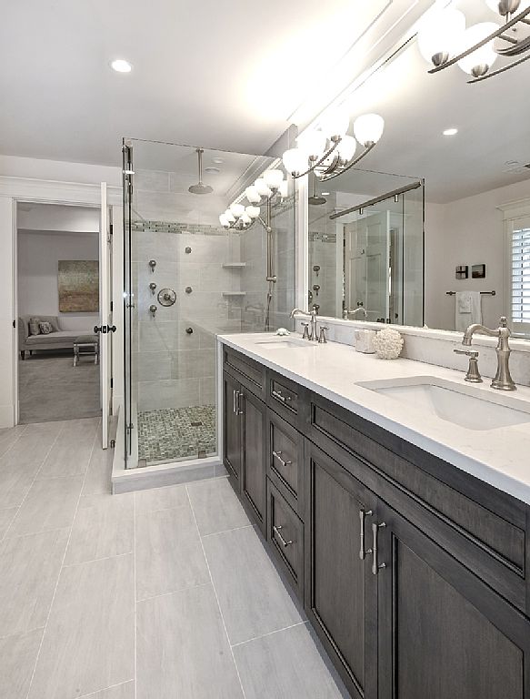 owner\'s bathroom with gray vanity