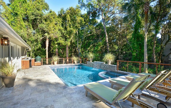 pool with lounge chairs