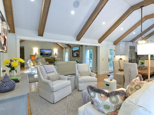 A living room with vaulted beamed ceiling