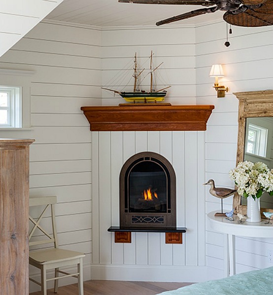 Sweet little bedroom fireplace in Cape Cod home