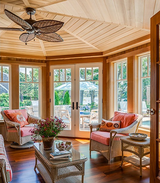 Wood-paneled sunroom in Cape Cod home