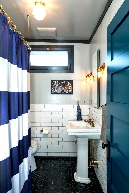 blue and white striped shower curtain in bathroom