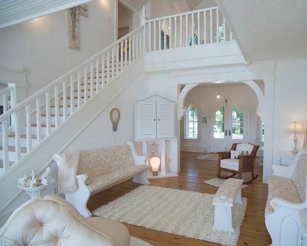 staircase painted white inside front entry hall