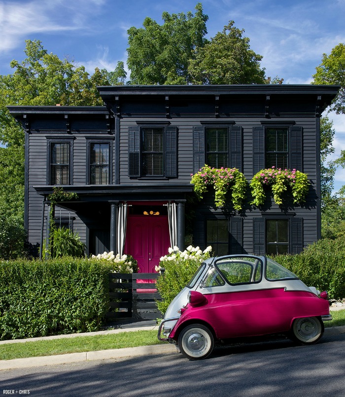 Roger and Chris's black house with pink door and pink car