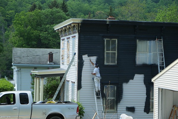 Painting the white Victorian house black