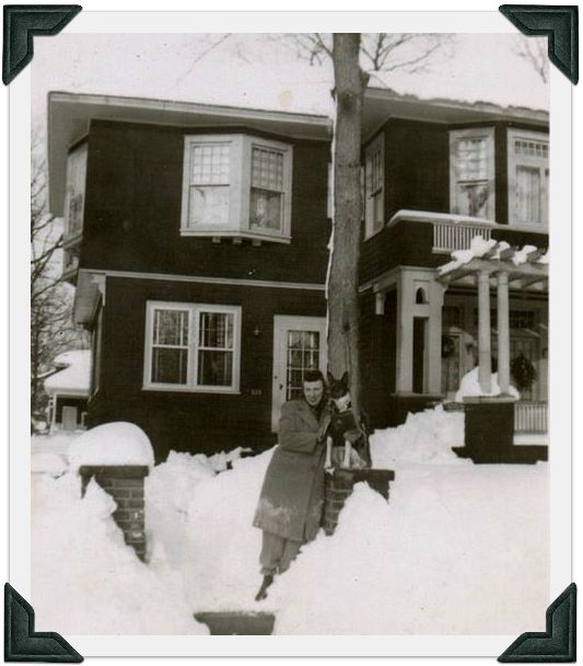 Charlotte and Spottie in old black and white photo in front of Allenhurst house