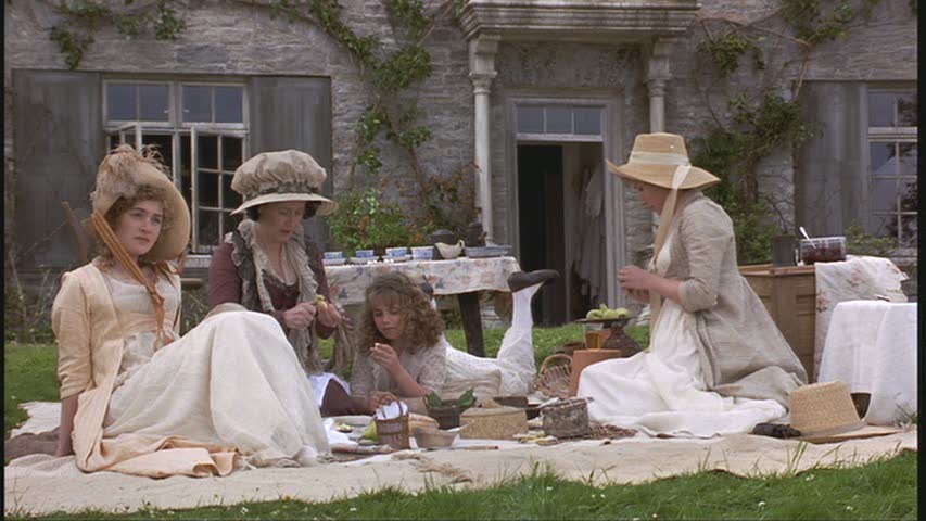 a picnic in front of the cottage