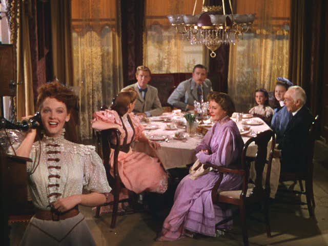 family gathered around the dining room table