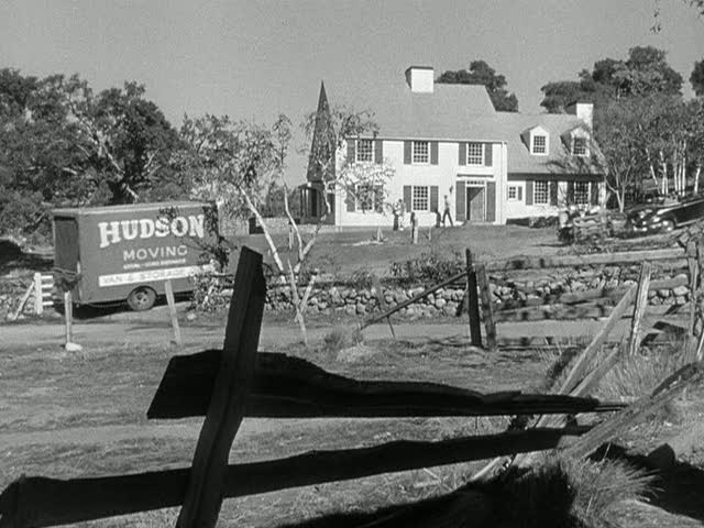 moving truck pulling up to Blandings house