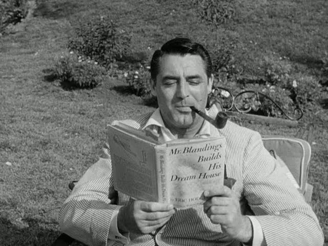 Cary Grant reading the book Mr. Blandings Builds His Dream House