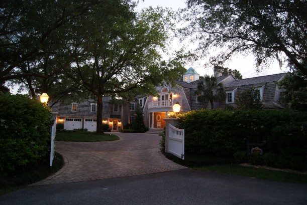 front gate leading to shingle style house