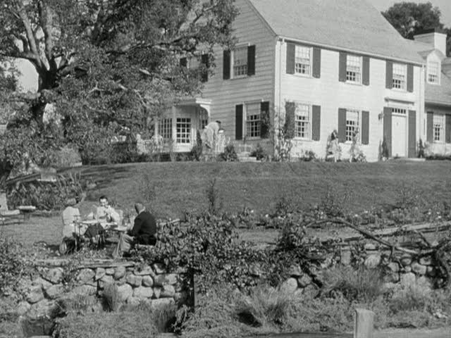 side view of exterior of house with shutters