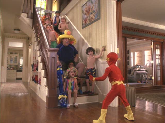 kids sitting on staircase in Daddy Day Care house